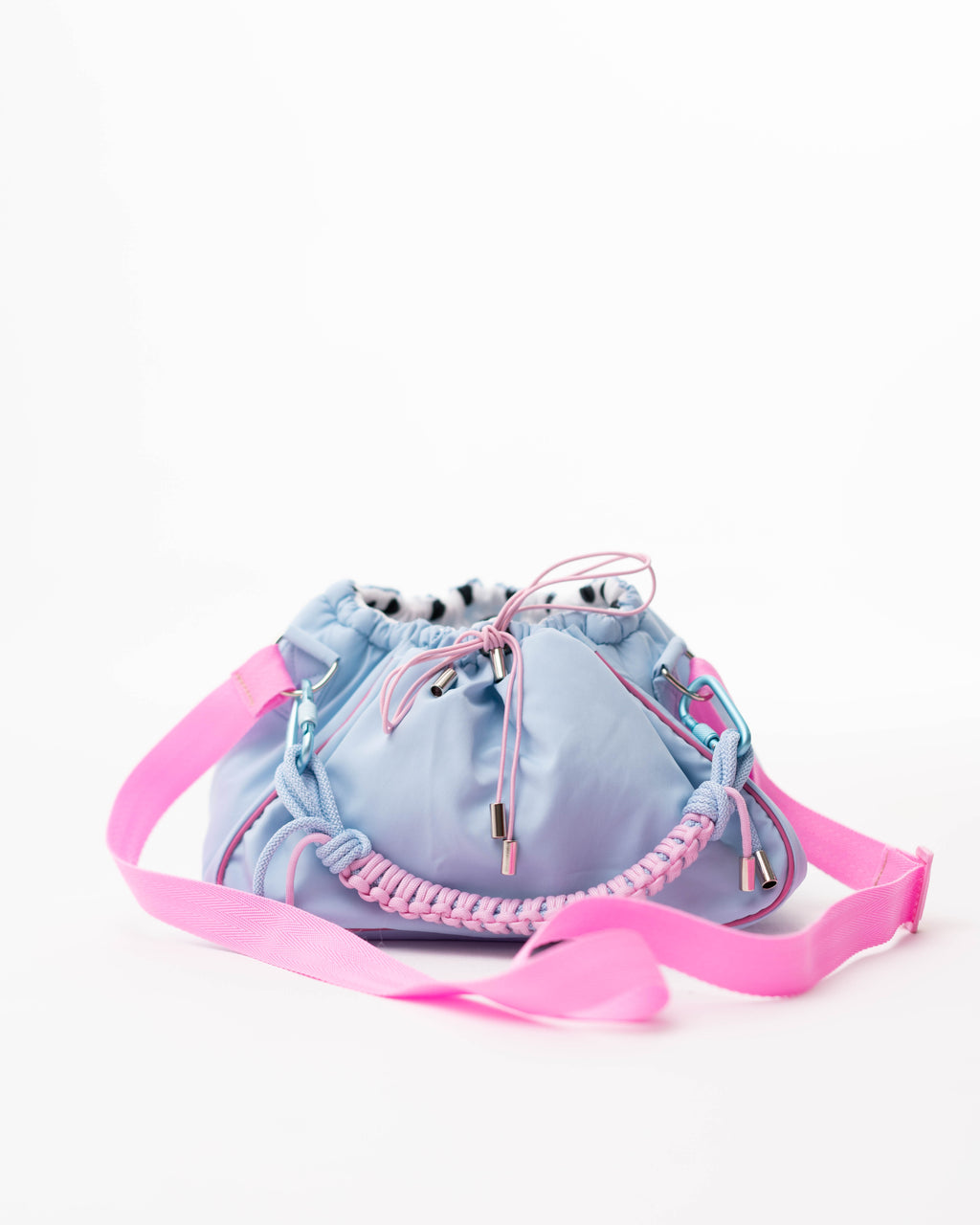 Blue Mini Bubzi bag with pink shoulder strap, braided paracord handle, and drawstring closure