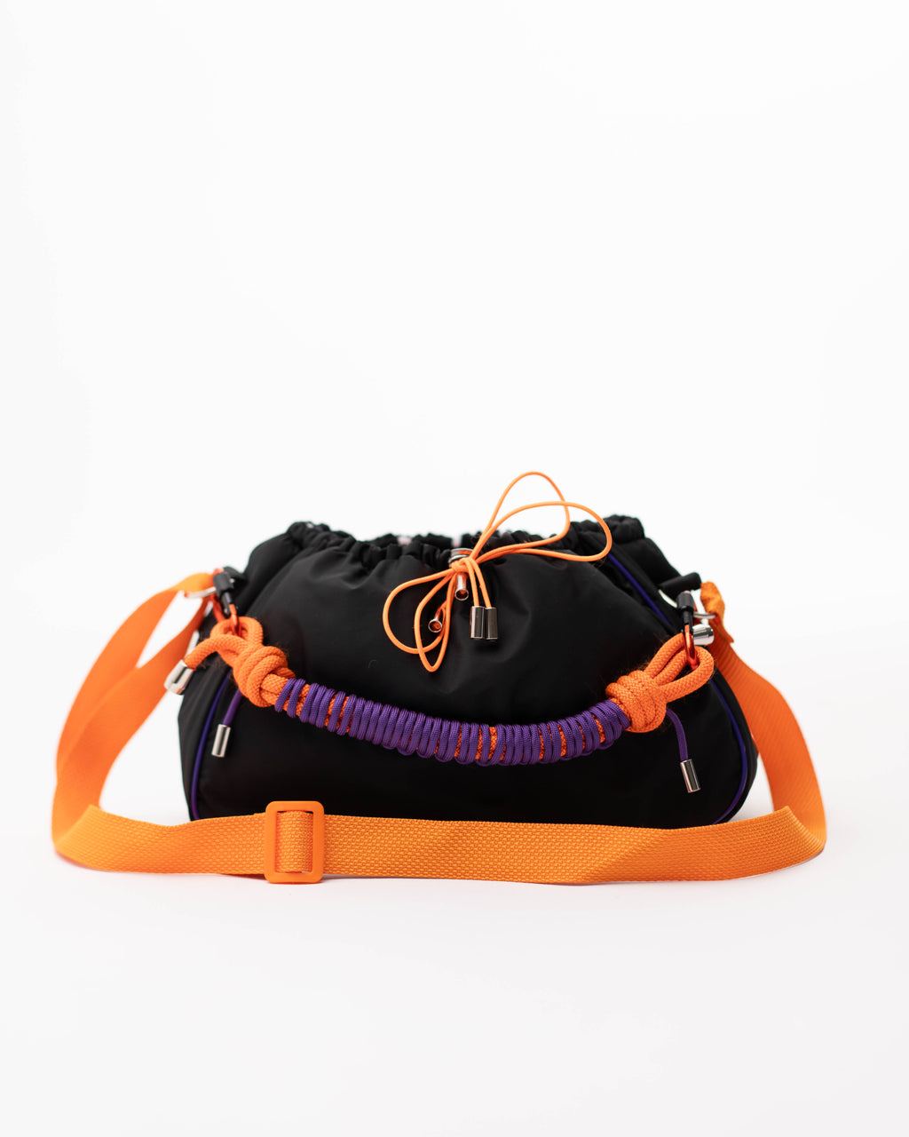 Black Mini Bubzi bag with orange shoulder strap, purple paracord handle, and drawstring closure
